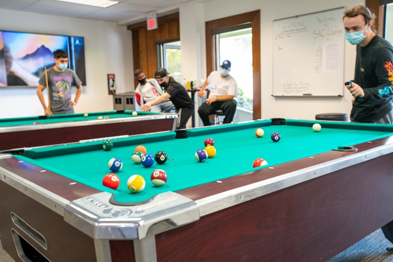 Students playing pool